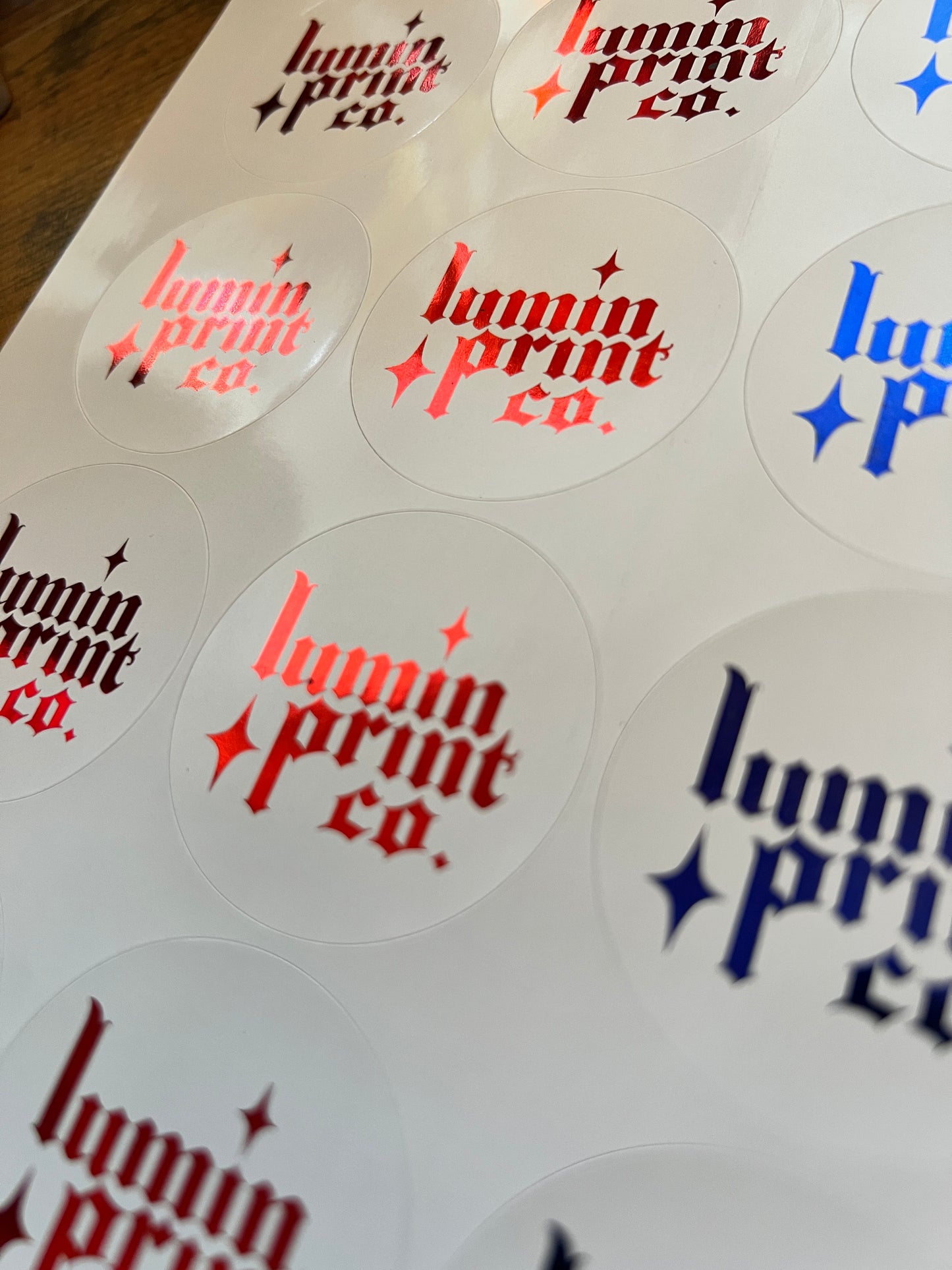 White Stickers with Foiled Text